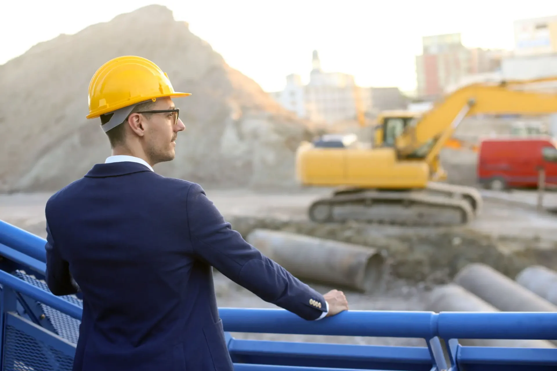 Man in hard hat at construction site.